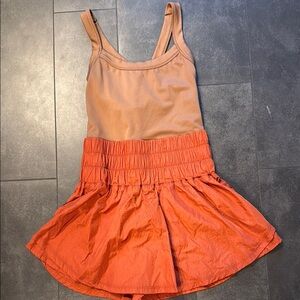 Free People Movement Orange and Tan dress.